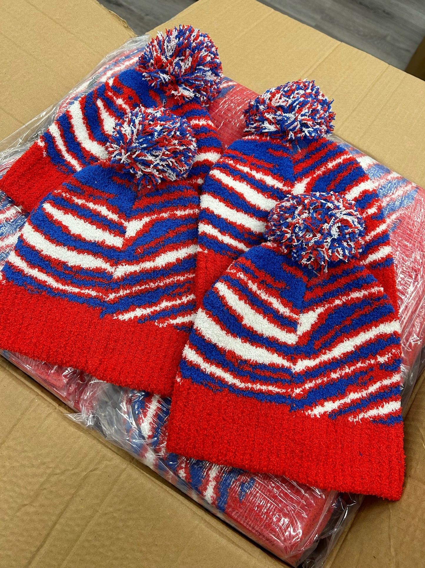 Buffalo Zebra Plush Pom Pom Beanie